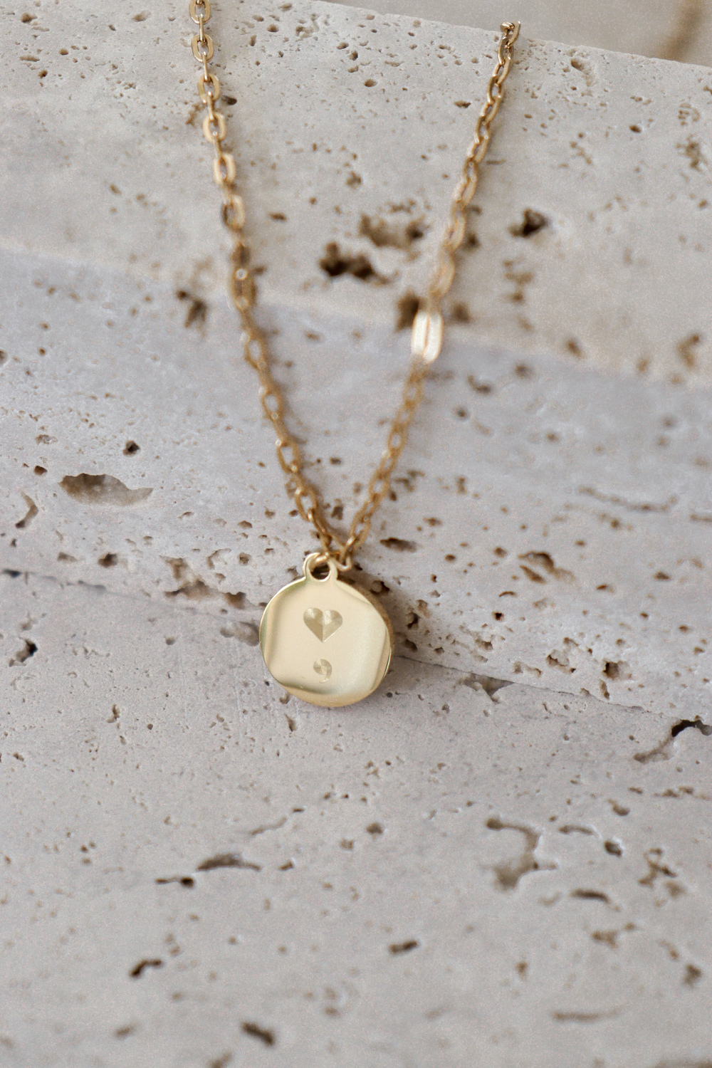 hart komma logo ketting